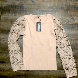 NWT. Size M. DOUBL JU. Ribbed stretchy with crochet sleeves